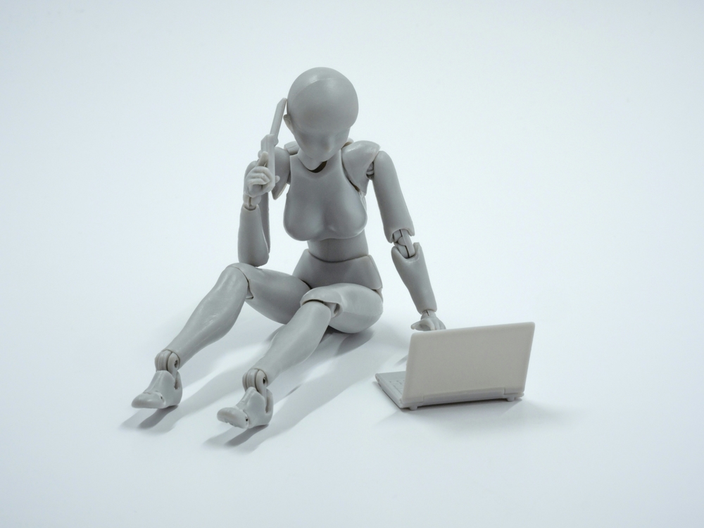 Female bot at a laptop